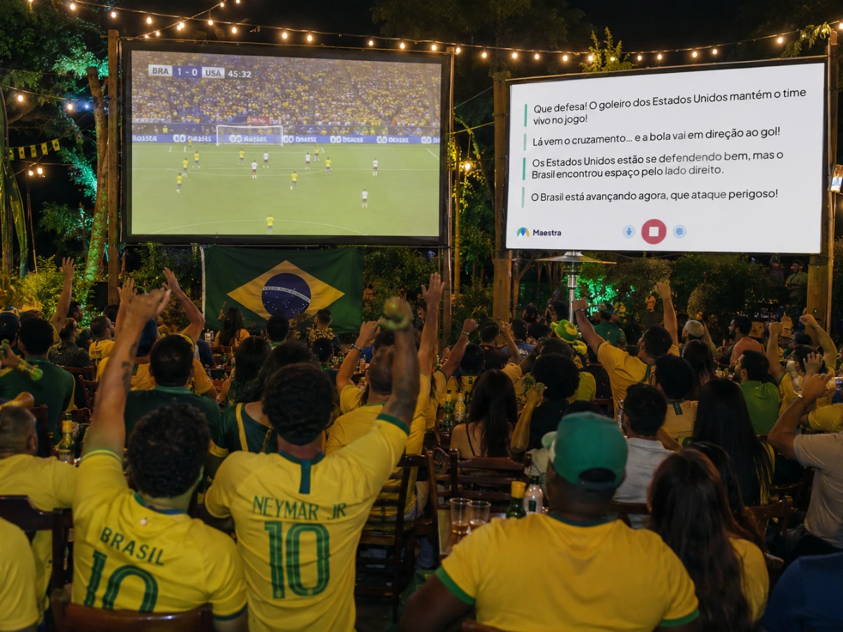 Soccer fans cheering in front of large screens displaying a match and live commentary captions.