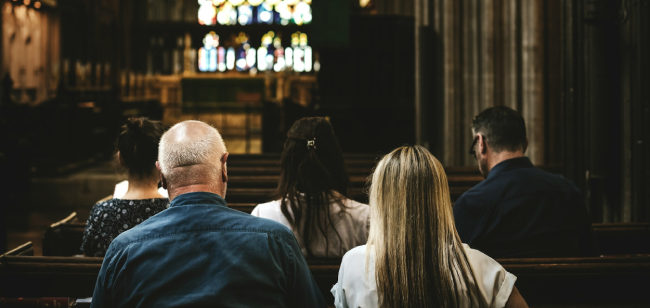 People praying during sunday service