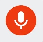 A red microphone icon indicating speech-to-text is enabled in Google Docs.