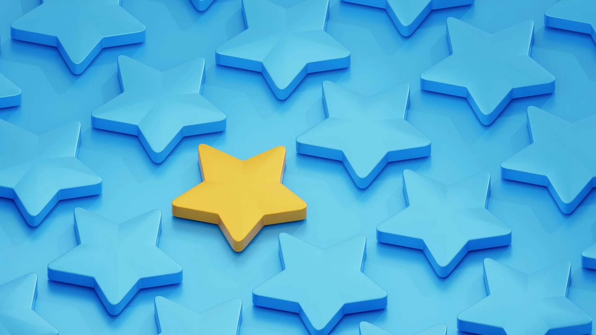 One yellow star among a field of blue stars.