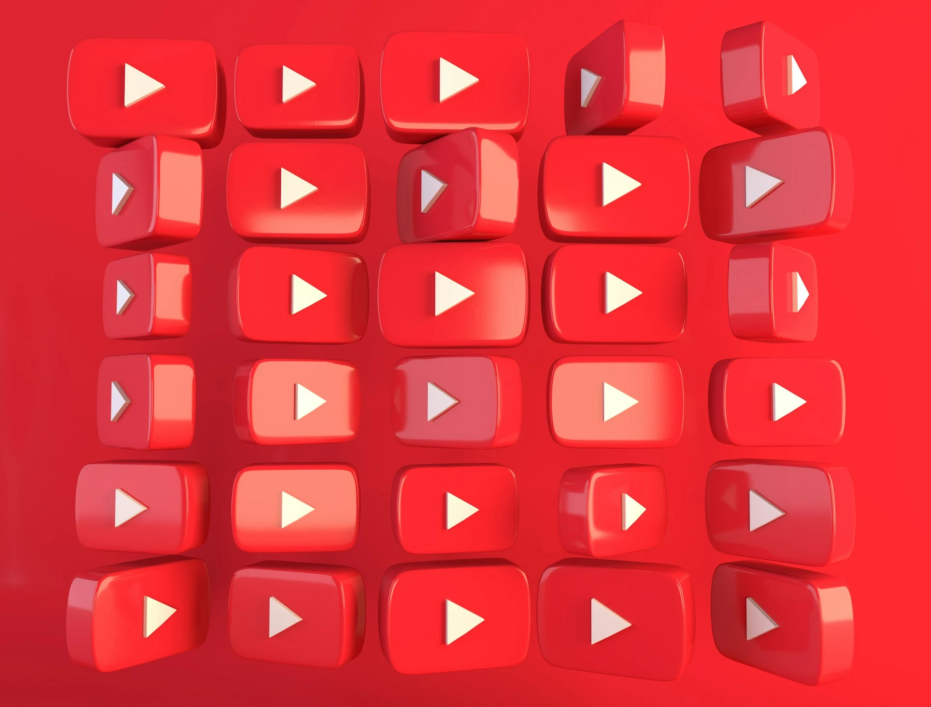 A set of YouTube icons on red background.