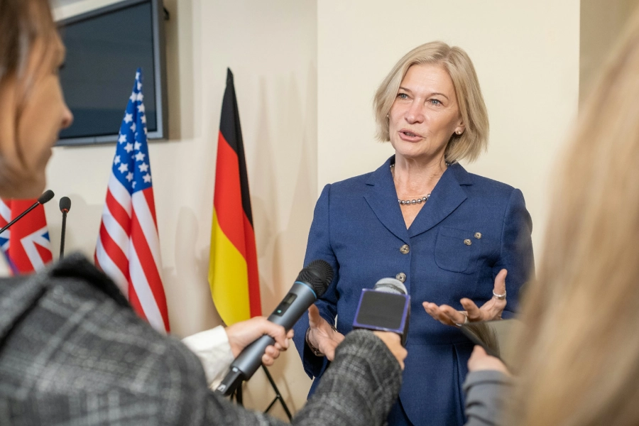 Journalists interviewing a politician