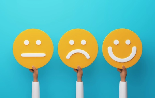 Three emoticons showing different feelings on blue background.