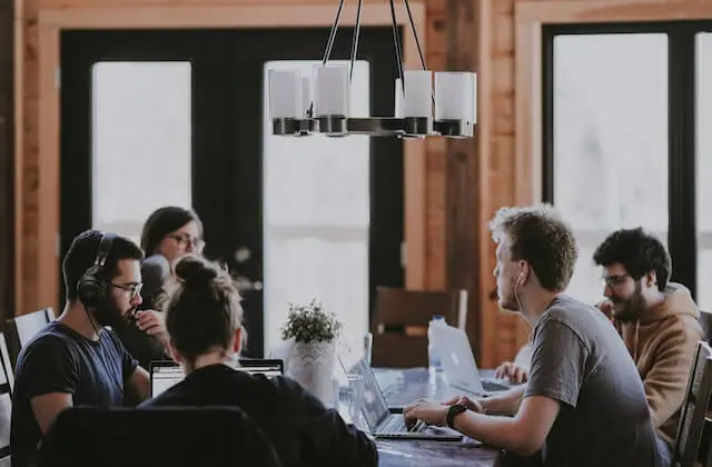 A small business team working around a table.