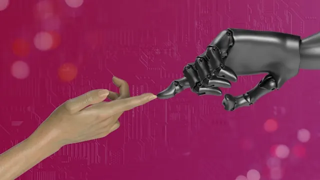 A human hand and a robot hand touching each other.