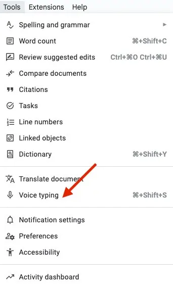 Google Docs Tools menu with a red arrow pointing at Voice typing.