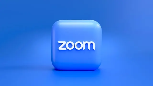 Zoom icon on a blue background.