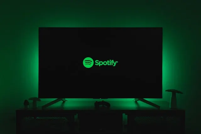 A TV screen showing the Spotify logo.