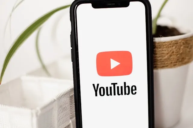 YouTube icon shown on a smartphone screen.