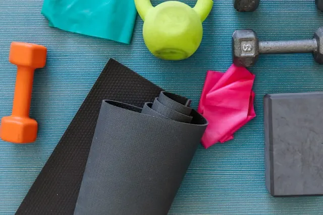 Fitness equipment on blue floor.