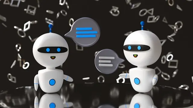 Two robots with speech bubbles talking to each other.