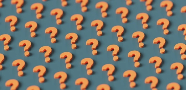 A set of orange question marks on blue background.