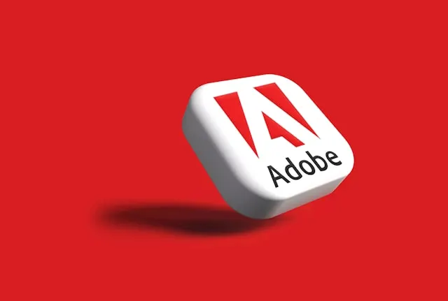 The Adobe logo on a red background.